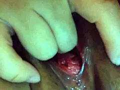 Asian mom finger banging herself on the bed in this home made XXX tape