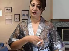 Having a cigarette and jerking off with my tits