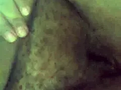 Mature housewife cleans the bathroom