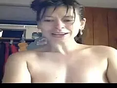Big breasted milf offers her huge tits and performs a live cam sex striptease