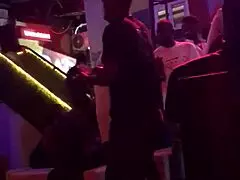 Sexually aware woman out for a casual affair and partially dressed in a public venue