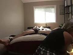 Older woman plays with her boyfriend’s feet and tongue her man’s cock