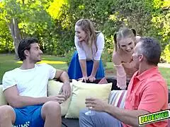 Couple and teen actively participate in a plenty of group blowjob