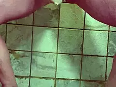 Pierced milf wife plays solo in the shower