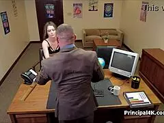 Spy cam catches a brunita milf getting fingered in the business office