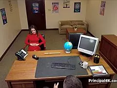 Spy cam catches a brunita milf getting fingered in the business office