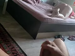 Detailed view of a woman of certain age being aroused while alone in the bedroom