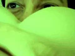 A thirty plus female with big boobs performing farts in 4k