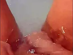 Tits, ass and pussy – blonde housewife gets lost in a bubbles while jerking off with a vibrator