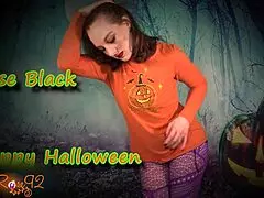 Hot middle aged woman taking off her halloween outfit