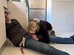 Horny blonde mature wife jerks the plumber’s dick in the kitchen