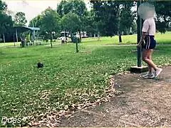 Public braless milf flashes shaved pussy in short skirt outdoors