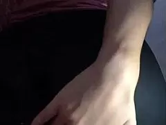 Beautiful young girl in pajamas shows her big ass in black shorts