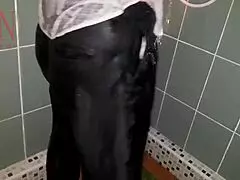 A lady in underwear under the shower