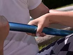 Busty redhead entertains pool boy with impressive assets