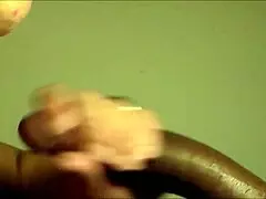 Cougar took a young black man's cock in her mouth and swallowed the cream