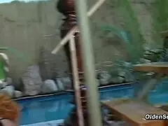 I can’t believe this muscular guy banging a curvy mature by the pool!