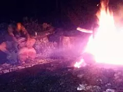 Late night bonfire for young lovers