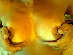 Stepmom massages her big natural tits with fresh cum