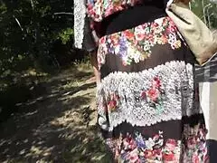 Hairy mature flashing in transparent dress outdoors