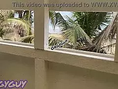Ebony wife boldly flashes her pussy at a beach house
