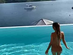 gorgeous monika fox strips bare for a swim in stunning pool