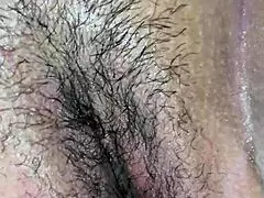 Latina teen shaves her tight pussy in a closeup bedroom video