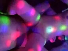 I’m pounding my cheating comadre under a rain of colorful lights