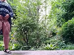 Wow, my mature mother-in-law pees standing up in a wild outdoor scene!
