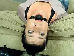 Stepmom takes on a tough deepthroat ballgag challenge.
