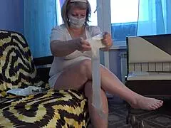 Plump nurse shows off sexual therapy tricks. She uses rubber dick and cream pie in hospital!