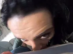 Yo, check this cheating wife sucking off her husband's buddy in a hot jumpsuit and fur jacket!