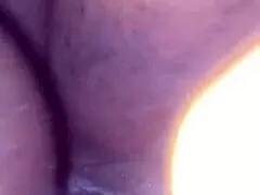 Curvy milf strips naked on a vibrant backdrop, revealing her tight wet pussy. Her squirting climax drips everywhere.