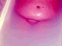naked chubby milf plays with wet pussy in bathtub