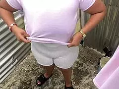 Ebony Latina amateur changes in beach dressing room while pervert films her big ass.