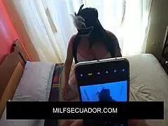 A big ass MILF grabs her stepson and begins watching some porn with him